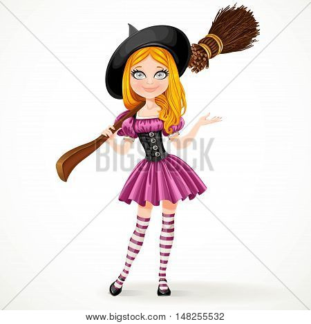 Cute teenage redhaired witch in purple dress with a broom on her shoulder isolated on white background