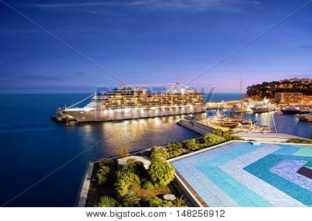 Monte Carlo, Monaco - October 07, 2014: Oceania Cruises ship Marina  docked at port of Monte Carlo, Monaco on October 07, 2014. Marina blends sophistication with a contemporary flair to create a casually elegant ambiance