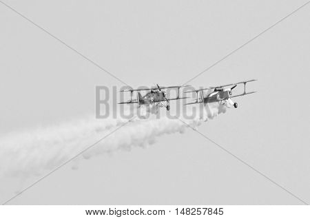 bi-plane in flight during an air show
