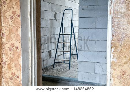 Stepladder in the room during capital repair