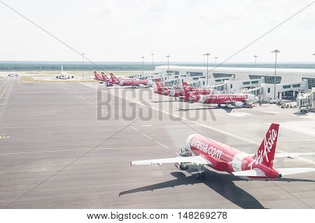 KUALA LUMPUR MALAYSIA - SEP 4 2016 - AirAsia flight in the airport. AirAsia Berhad is a Malaysian low-cost airline headquartered near Kuala Lumpur Malaysia