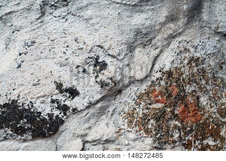 Scabrous gray natural stone texture floor, background, surface, closeup,