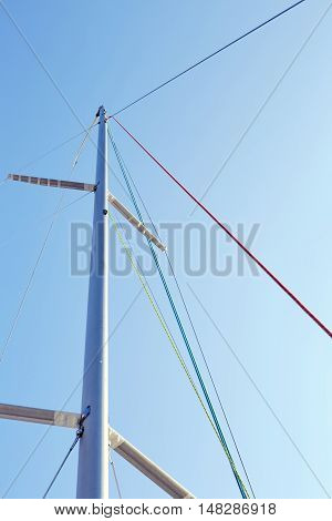 Staysail halyard on the mast, near the spreaders, snrouds and backstay