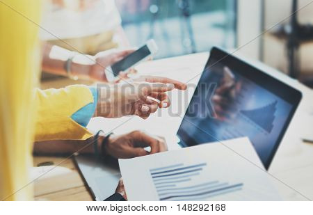 Closeup Young Woman Using Modern Tablet Hand.Hipster Working Great Business Idea Process.Coworkers People Gathered Together Decision Corporate Work.Startup Creative Presentation Concept Blurred