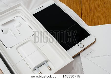 PARIS FRANCE - SEP 16 2016: New Apple iPhone 7 Plus unboxing in the first day of sales - full unboxing new Earpods and accesories. New Apple iPhone acclaims to become the most popular smart phone in the world in 2016