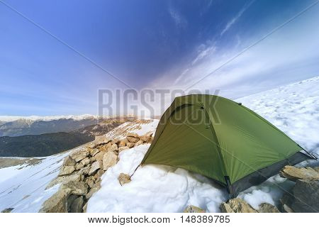 Camping on the top of the mountain in winter.