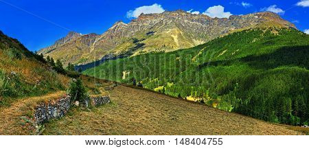 Alpien mountains with meadow math of Rhemes Notre Dame