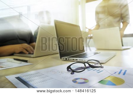 Young man and woman startups business meeting to discuss the situation on the marketing in the meeting room.