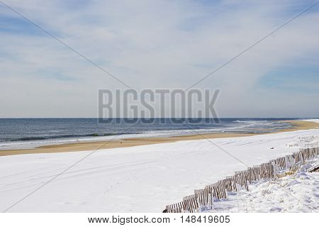 Atlantic ocean waves on the beach at Hamptons, Long Island, New York, Suffolk County in Winter, 2016