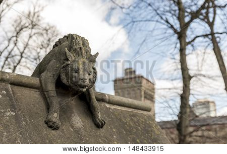 Hyena statue, on the walls of Cardiff castle, in Wales, UK