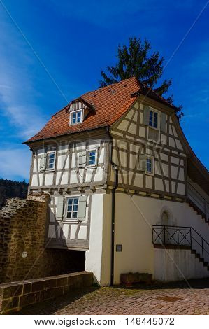 Residential tudor style house , with blue sky in background. Castle Neuenb rg in Germany.