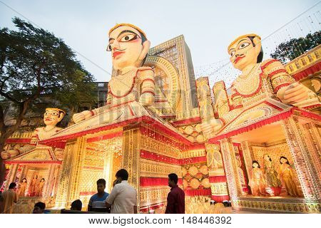 KOLKATA INDIA - OCTOBER 21 2015 : Beautiful exterior of decorated Durga Puja pandal at Kolkata West Bengal India. Durga Puja is biggest religious festival of Hinduism.