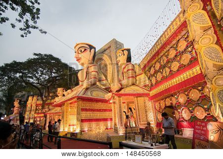 KOLKATA INDIA - OCTOBER 21 2015 : Beautiful exterior of decorated Durga Puja pandal at Kolkata West Bengal India. Durga Puja is biggest religious festival of Hinduism.
