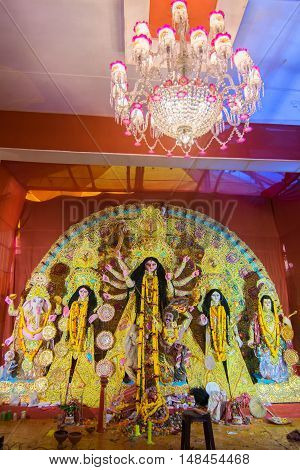 KOLKATA INDIA - OCTOBER 21 2015 : Beautiful interior of decorated Durga Puja pandal at Kolkata West Bengal India. Durga Puja is biggest religious festival of Hinduism.