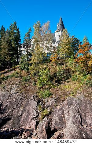 IMATRA, FINLAND - SEPTEMBER 13, 2016: Spa Hotel Rantasipi Imatran Valtionhotelli. Was built in 1903 and designed by the Art Nouveau castle. Canyon of The Imatrankoski Rapids on Vuoksi River