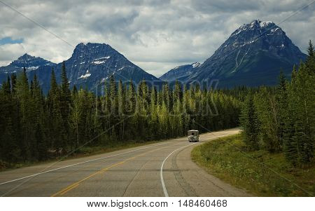 Recreational Vehicle Motorhome Driving through the Rocky Mountains