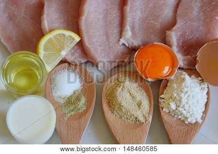 all ingredients on table for make pork schnitzel
