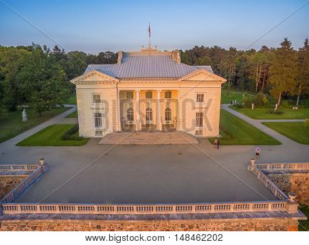 Trakai, Lithuania: Aerial UAV top view of Uzutrakis Palace in the autumn sunset