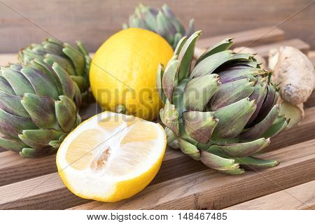 Ripe Organic Artichokes On The Wooden Lattice