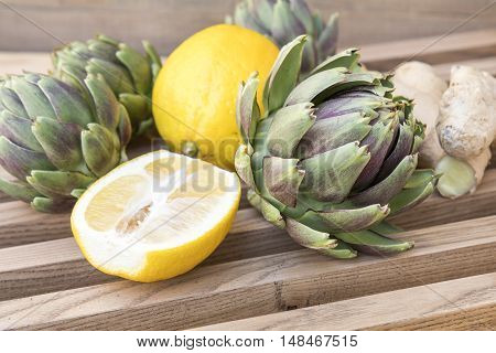 Ripe Organic Artichokes On The Wooden Lattice