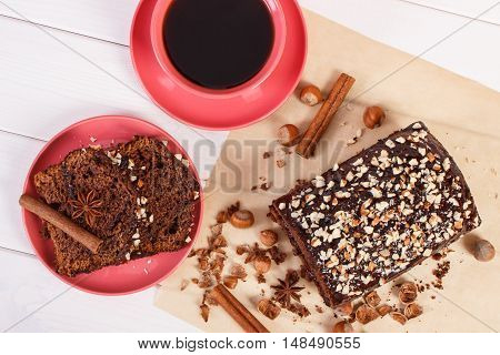 Dark Cake With Chocolate, Cocoa And Plum Jam, Cup Of Coffee, Delicious Dessert