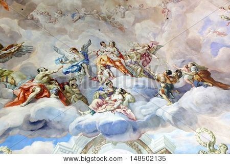 VIENNA AUSTRIA - NOVEMBER 232013: The Karlskirche (St. Charles's Church). Vibrant frescoes of saints and angels decorate the vaulted interior dome of Viennas Karlskirche.