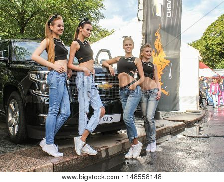 St. Petersburg, Russia - 12 August, Group of young girls in the SUV,12 August, 2016.
The annual International Festival of Motor Harley Davidson in St. Petersburg Ostrovsky Square.