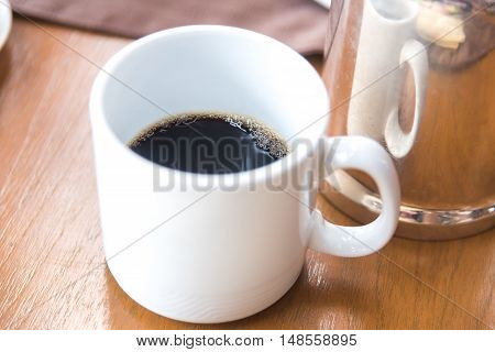 Black Coffee In White Cup In The Morning
