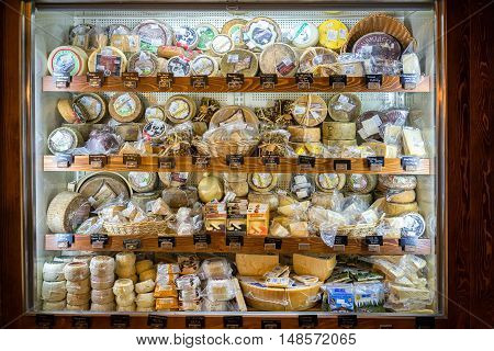 Kotor Montenegro - September 02 2015: cheese vitrina at their popular COGImar fish shop.