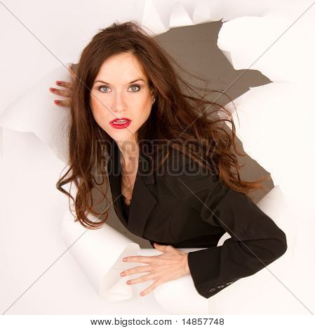Break Through Serious Business Woman Breaks into Hole in Wall