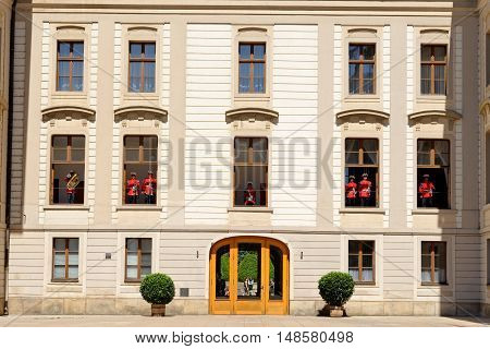 PRAGUE, CZECH REPUBLIC - JULY 4, 2014: Castle guards (Hradni straz) of presidential palace during ceremonial changing of guards. It takes place daily at noon accompanied by a brass band.