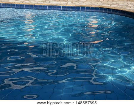 Swimming Pool water textured surface summer ripled