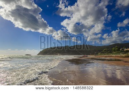 Summertime.Gargano coast: Portonuovo beach,Vieste-(Apulia) ITALY-It is a succession of fine sand dunes,crossed by many little kars streams,that cool the visitors in the hot summer time.