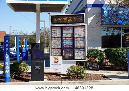 PLAINFIELD, ILLINOIS / UNITED STATES - SEPTEMBER 19, 2016: Drive-through customers may select from items posted on the menu posted outside the White Castle Restaurant in Plainfield.