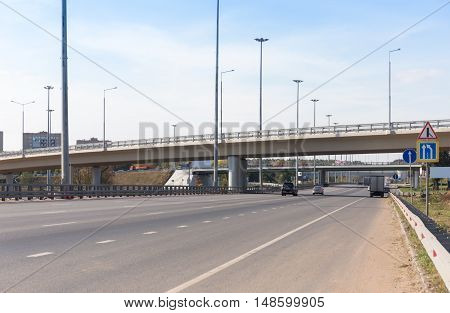 Elevated road across the multilane highway in Russia