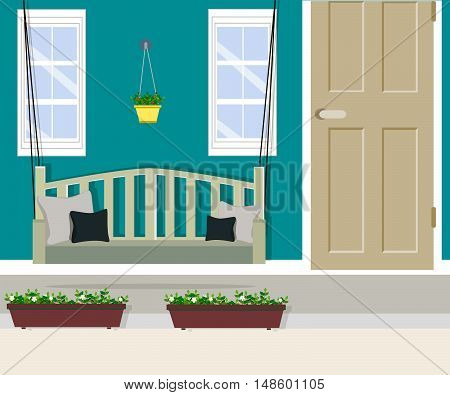 Interior. Swing bench near blue wall with windows.