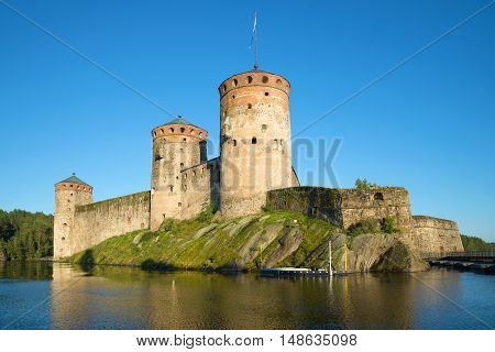 View of Olavinlinna fortress on evening in august. Savonlinna Finland