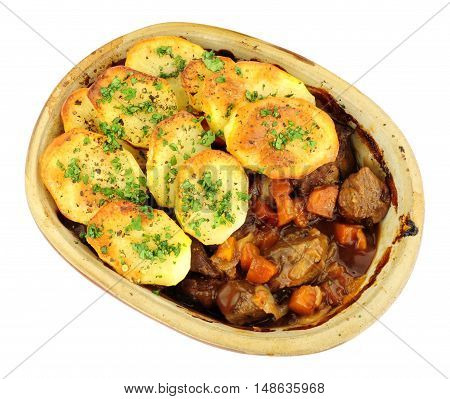Traditional potato topped Lancashire hotpot isolated on a white background