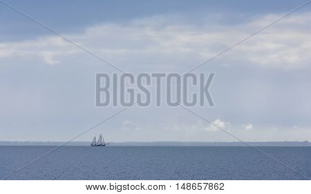 Sailing ship (flatbottem) on IJsselmeer near Marken in The Netherlands