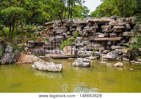 Asian rocky pond zen garden, inside a  park in china