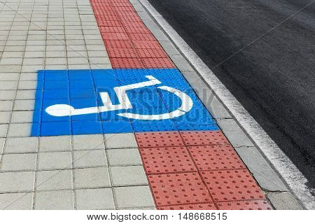 Disabled Parking Sign On Street. Road Sign