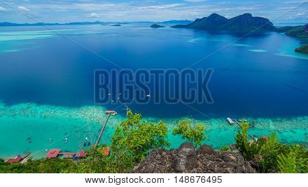View on top of Bohey Dulang island near Sipadan Island,Sabah,Borneo.Tropical paradise island with bright smooth mirror sand & crystal clear water with rocky shore in the island of Semporna,Borneo