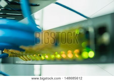 Blurred network optical fiber cables in swhite