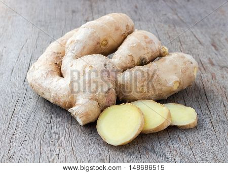 Fresh ginger on old wood backgroundraw material for cooking