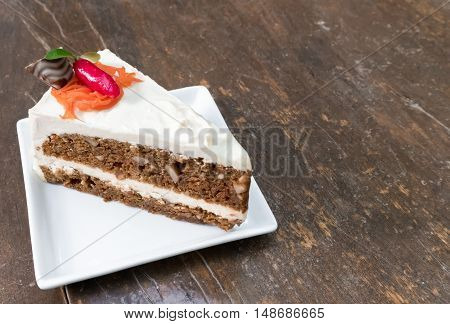 Carrot cheesecake carrot cake on wood table background