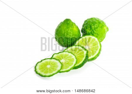 Closeup bergamot slice on white background selective focus