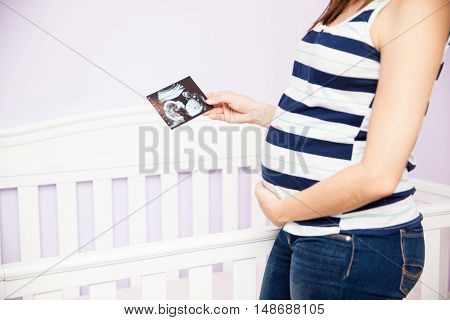 Pregnant Woman With An Ultrasound Picture