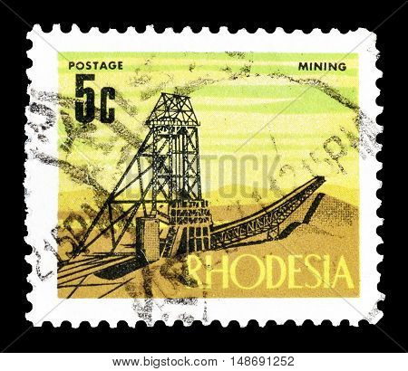 RHODESIA - CIRCA 1970 : Cancelled postage stamp printed by Rhodesia, that shows Mining.