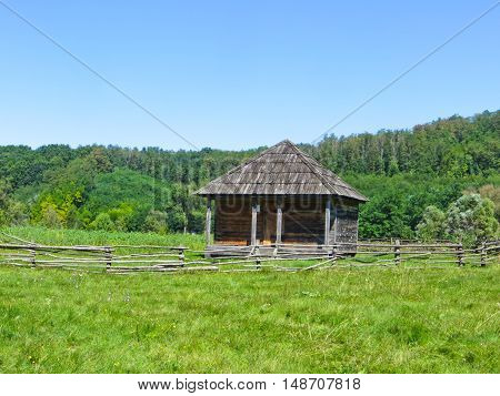 Building in traditional ukrainian style on a green meadow