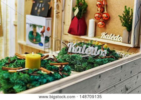 Stall With Christmas Wreath At Christmas Market In Vilnius